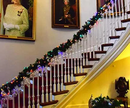 Beautiful staircase and portrait of the Queen Elizabeth II