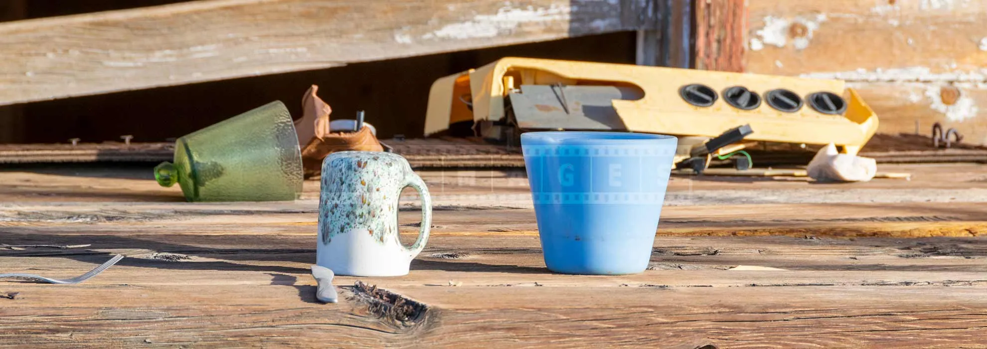Details of a table with knife, fork and cups, meal that stretched forever