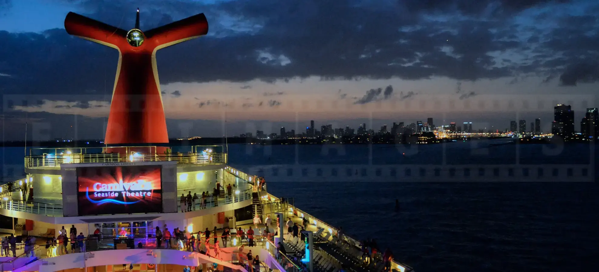 Carnival Liberty top entertainment deck at sunset near Miami, FL