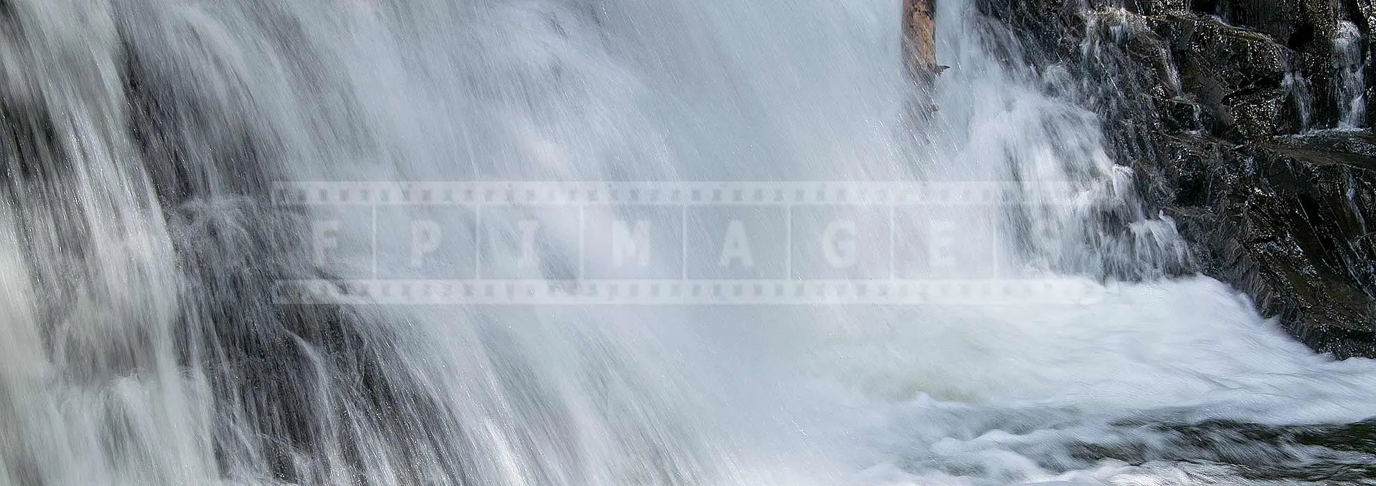 Water falling at Dawson brook falls in Nova Scotia