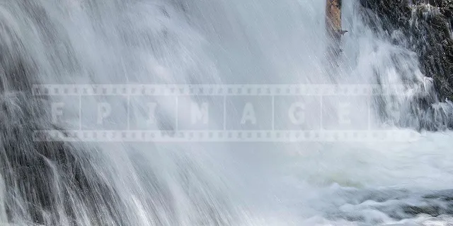Water falling at Dawson brook falls in Nova Scotia