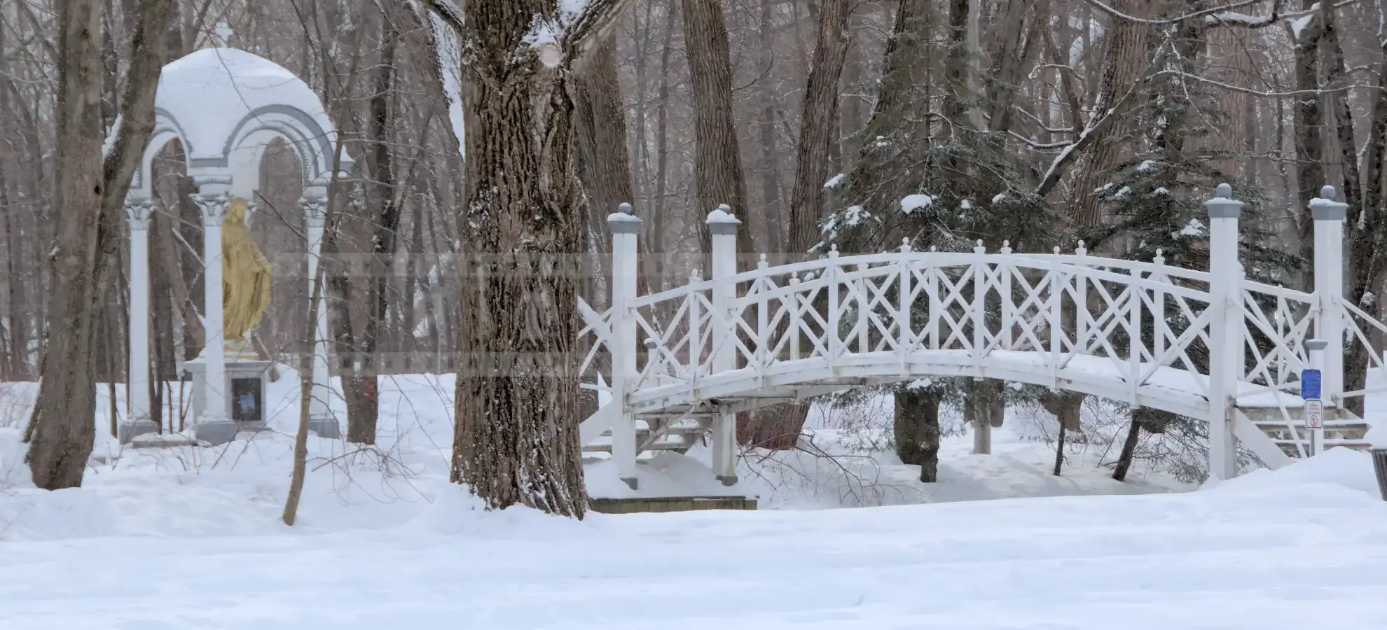 Pretty bridge and Virgin Mary statue