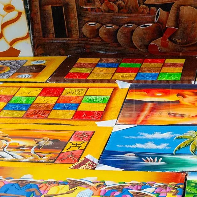 bright and colorful paintings at Dominican beach market