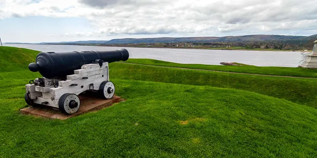 old cannon and Annapolis river at historic fort