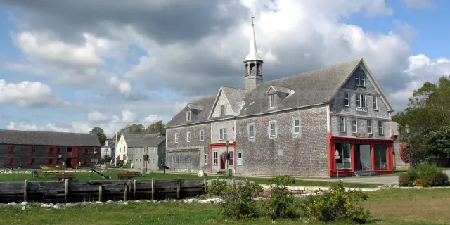Old wooden buildings on waterfront in Shelburne, NS, Canada