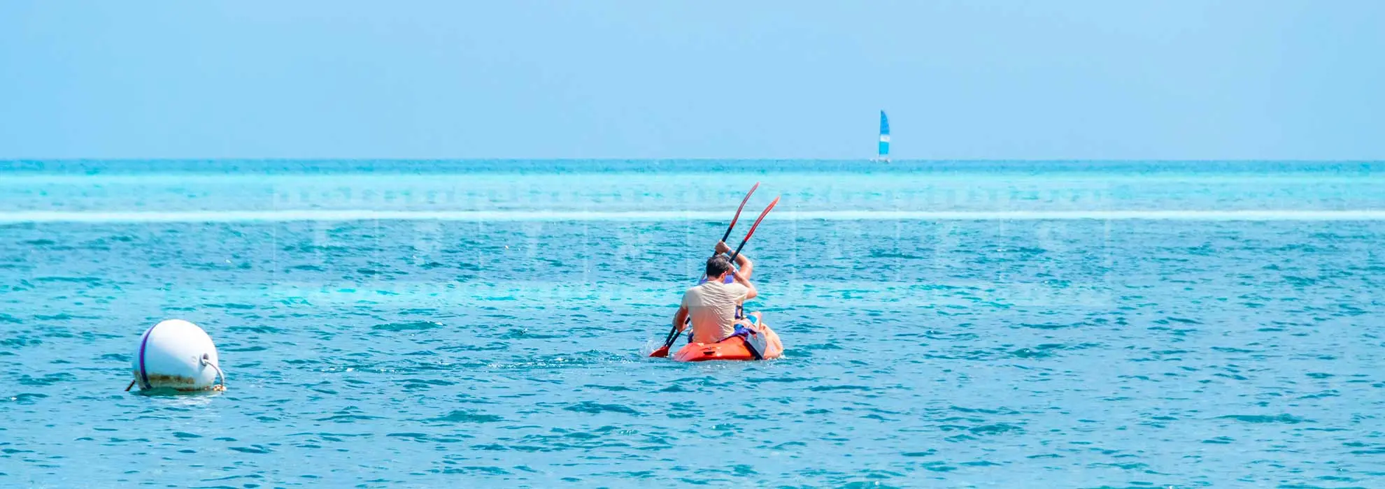 People enjoying kayak at Iberostar Daiquiri beach cuba