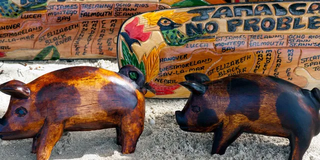 beachfront market with jamaican wood carvings