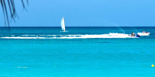 sailing boat, sea doo and motor boat active watersports in Jamaica