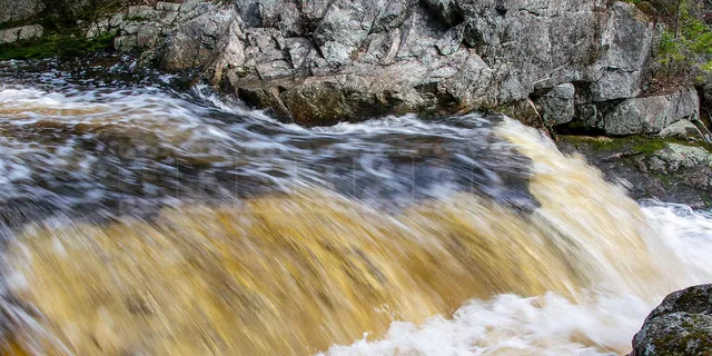 fast moving water at Millet Falls waterfall