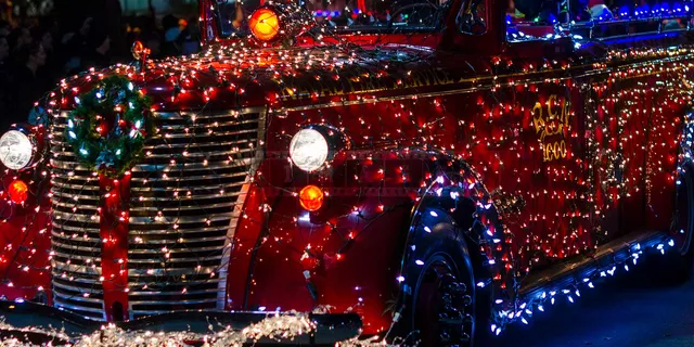 Amazing Christmas decorations of a fire truck at the parade