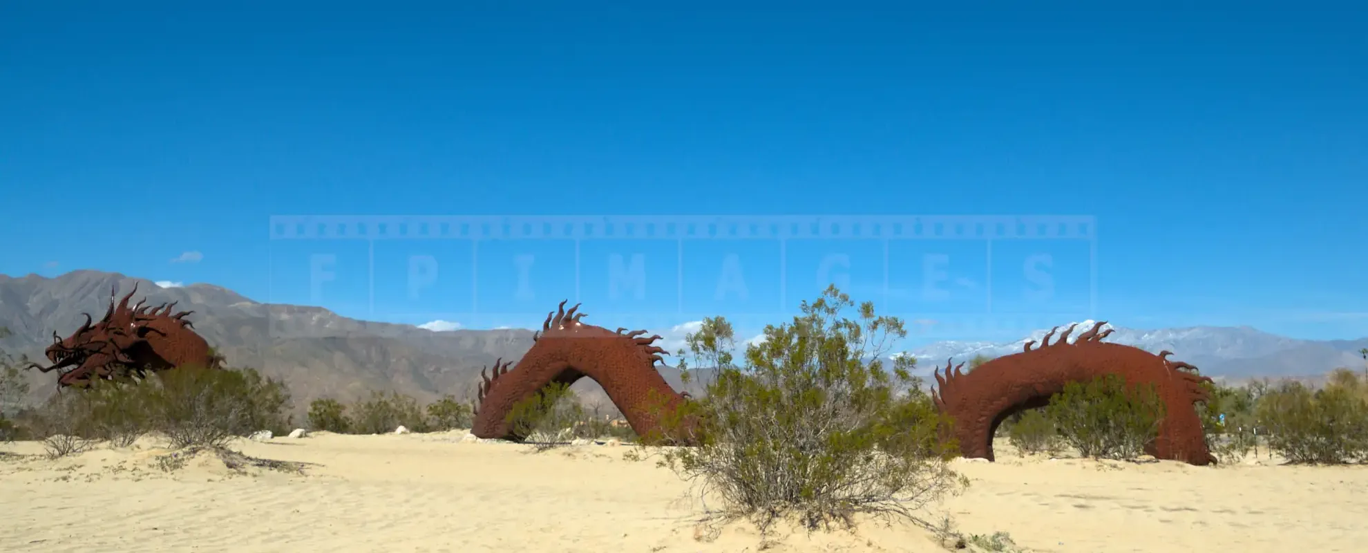 Sea Dragon metal sculpture rising from the desert sand Borrego Springs area, California