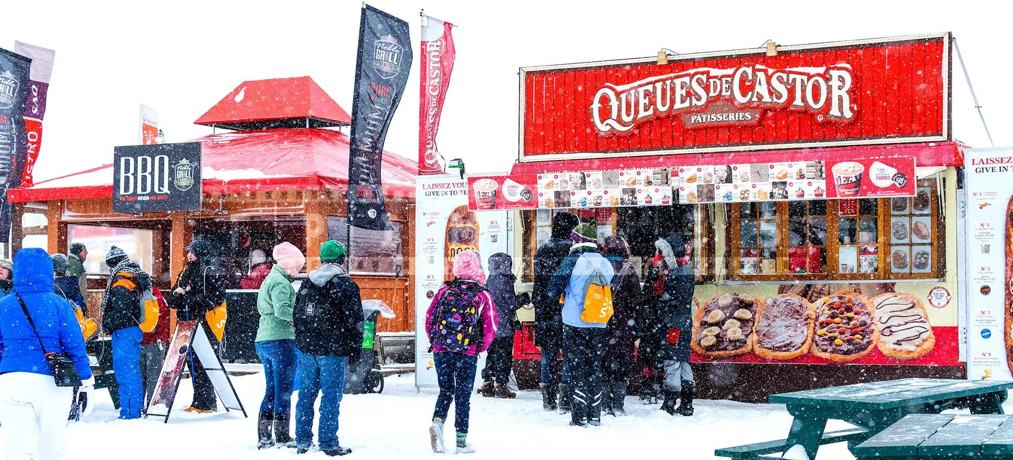 Line ups in winter to street food kiosks - barbecue and beaver tails