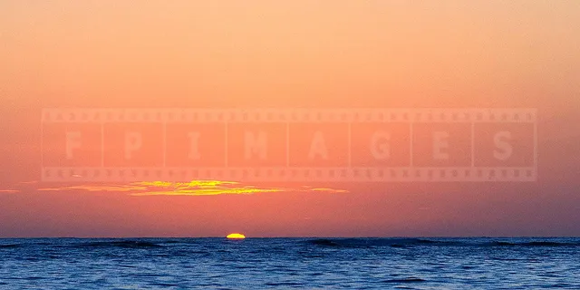 sun rising above the ocean in punta cana