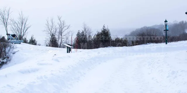 winter trail in plains of abraham park in quebec city