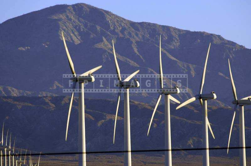 WindMills and Mountains at Sunrise Landscape