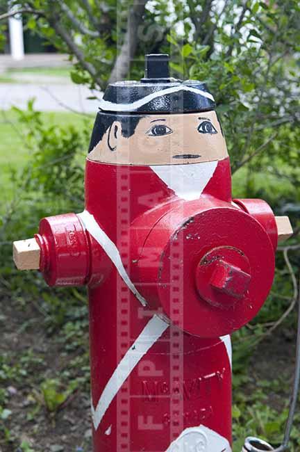 Red firefighting hydrant decorated as British loyalist