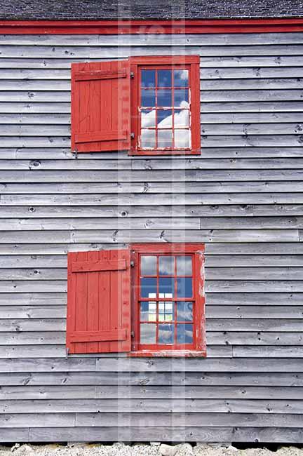 Two red windows with shutters, "six over six" - 18-th century style