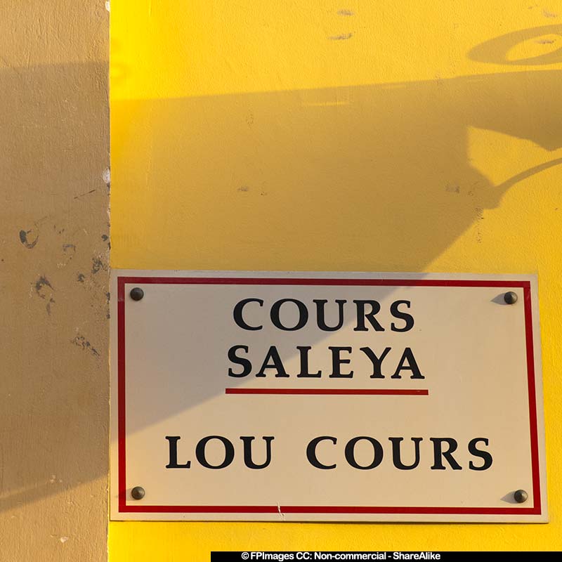 Bright yellow wall with Cours Saleya sign, free image