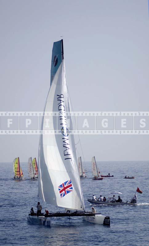 Image of a boat under full sail