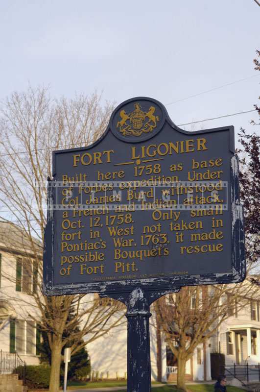 Street photo of memorial plaque