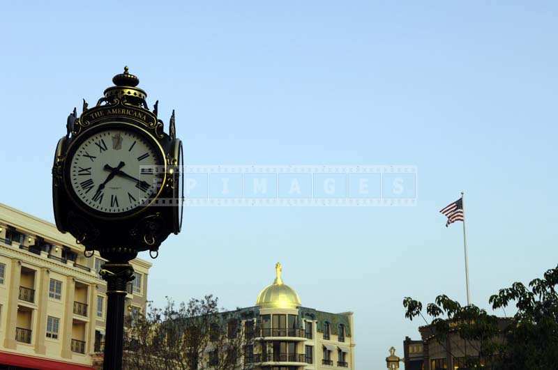 A Graceful Clock Post with “The Americana” Sign