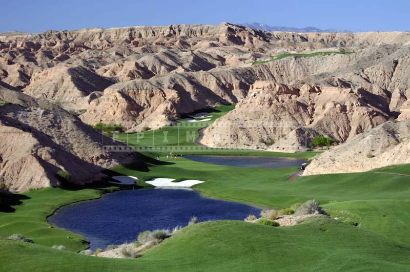 Hole #12, dogleg left with water hazard, golf pictures