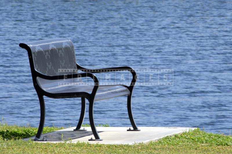 A Bench near the Serene Waters of the Lake