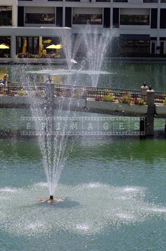 Arched Bridge across the Lake with fountains