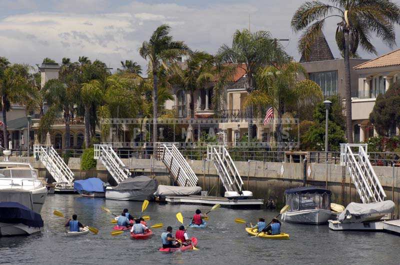 People in kayaks exploring area