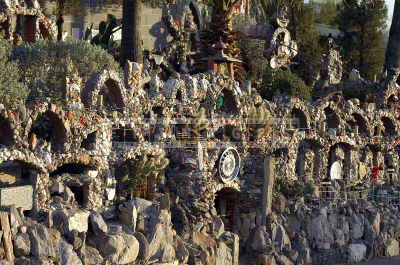 Louis Lee Rock Garden street facing wall with lots of decorations