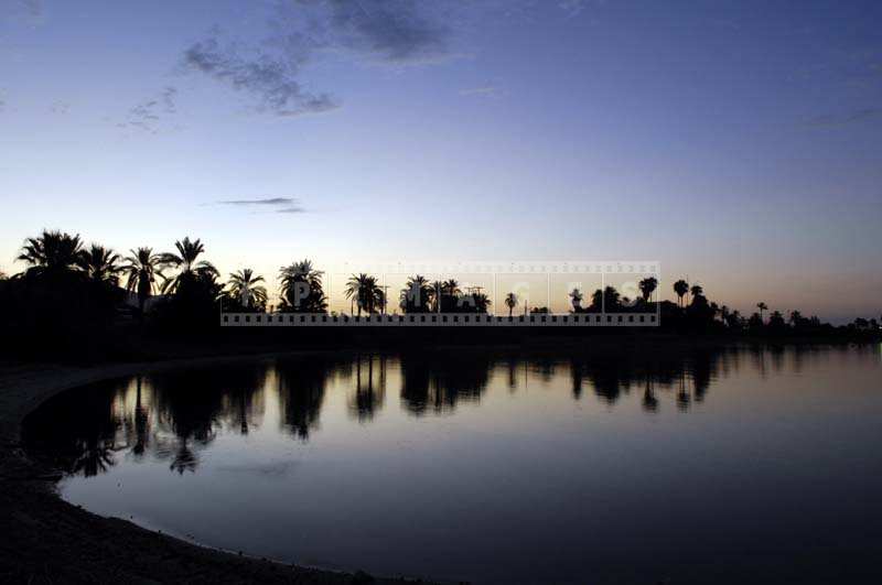 reflections in the lake at sunrise