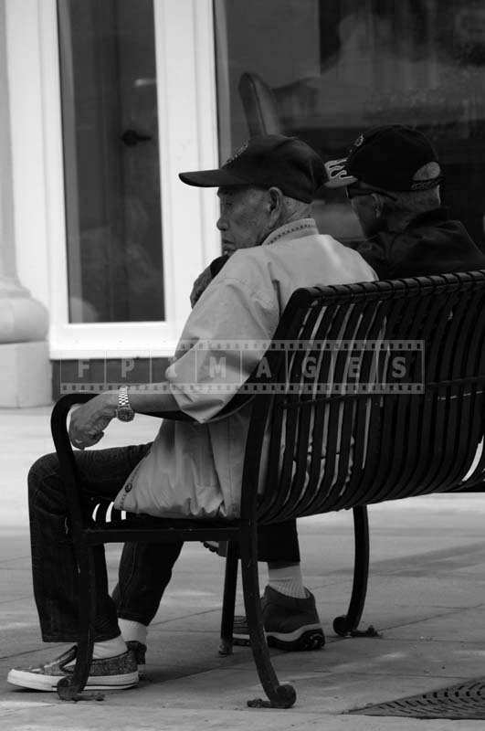 Senior Citizens Sitting on a Bench