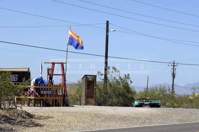Jackass Flats and Arizona Flag near scenic route