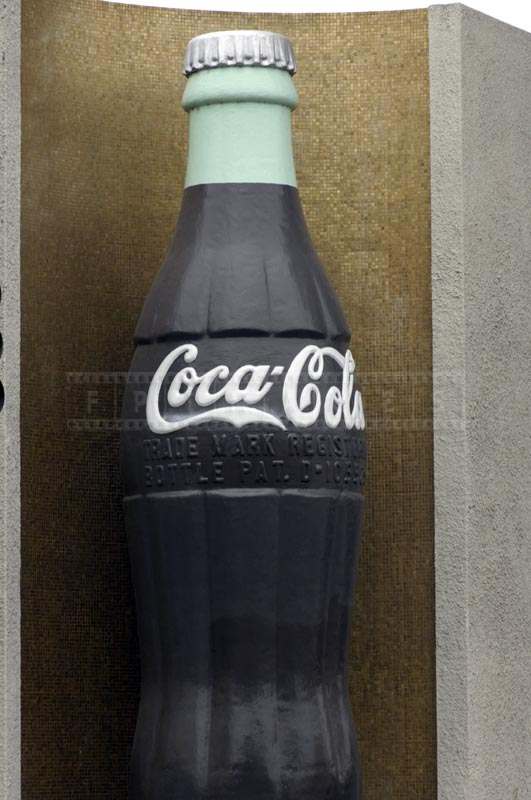 enlarged replica of the original coke bottle