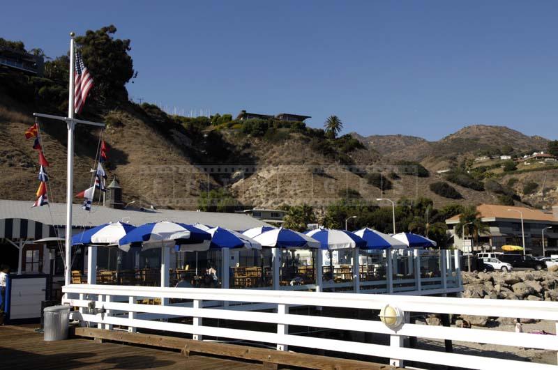 White & Blue Beautiful Umbrellas Shaded Seating Area