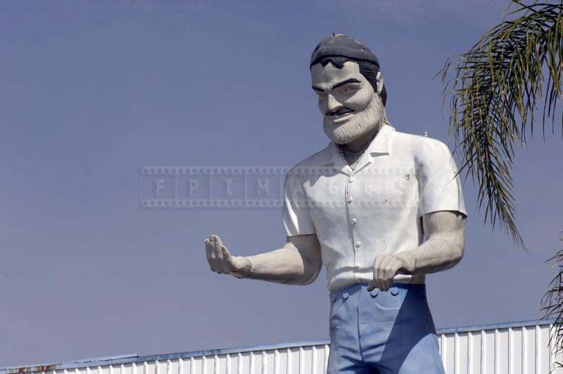 Close View of the Smog Check Muffler Man