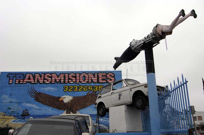 Sculptures with the Backdrop of Transmissions Signboard