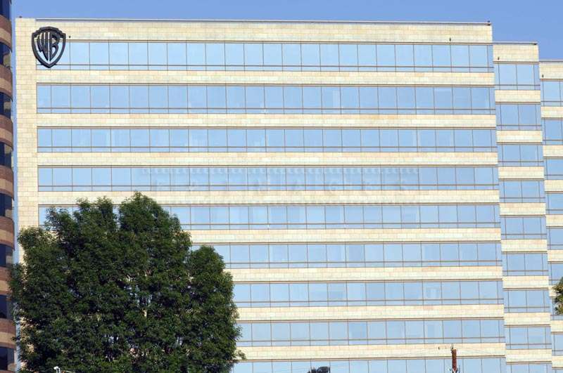 Blue Glass Building with WB Logo