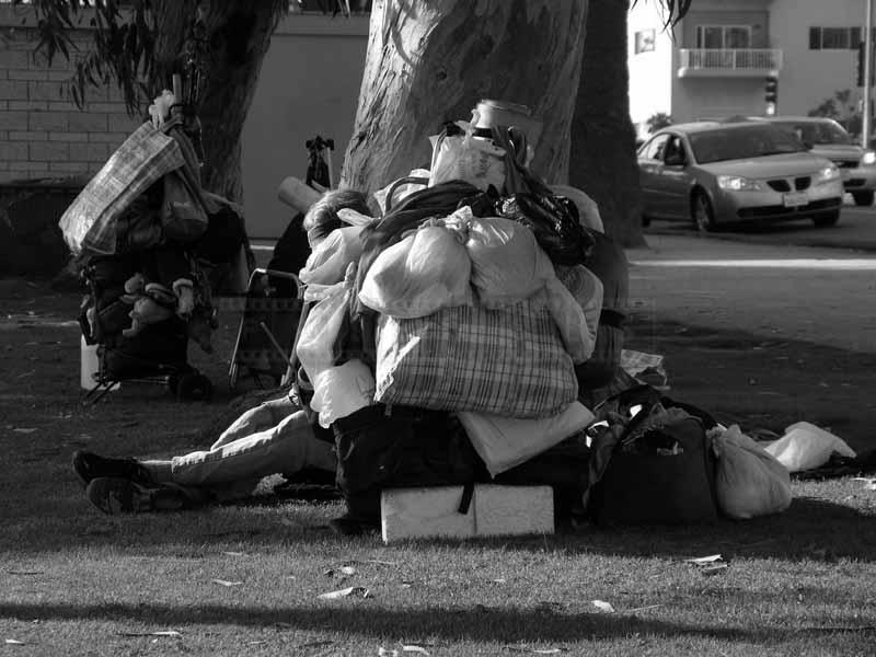 Plastic bags keep belonings of a homeless