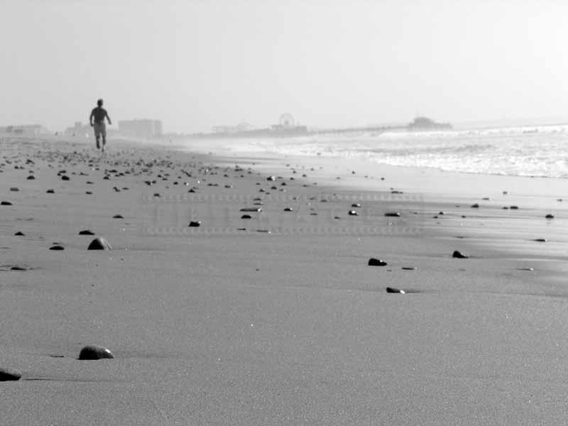 A jogger on the beach in Santa Monica