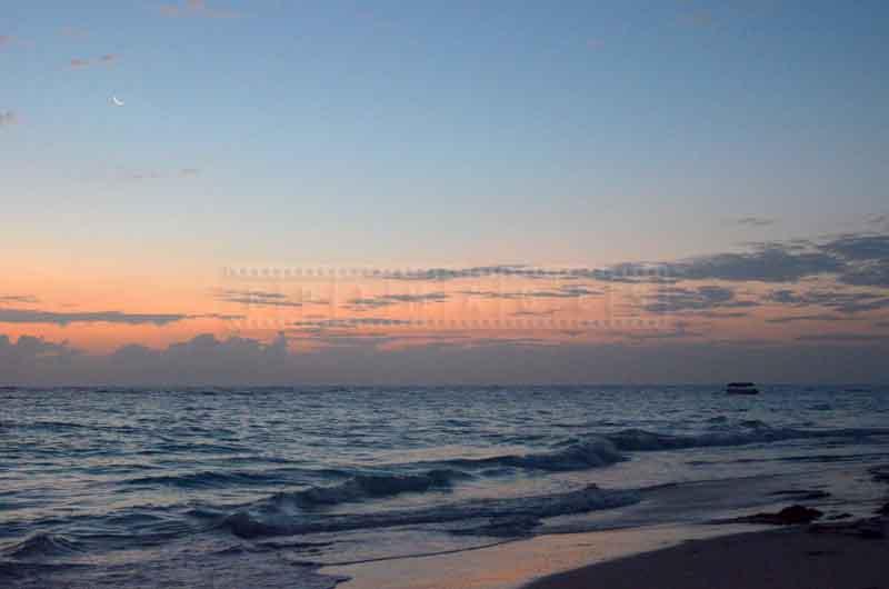 New moon at sunrise light just before the sunrise in Dominican Republic