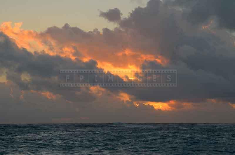 Dramatic golden sunrise at Bavaro beach