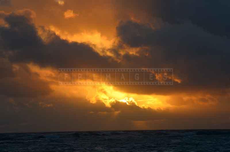 Dramatic golden sunrise at Bavaro beach