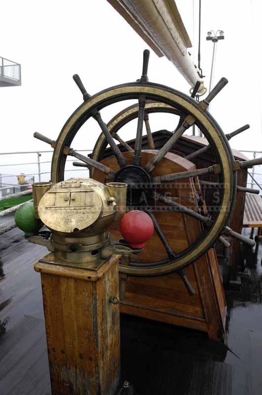 Ship's wheel and compass