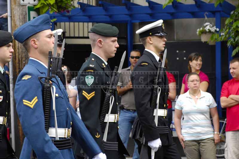 Marching Canadian soldiers with guns