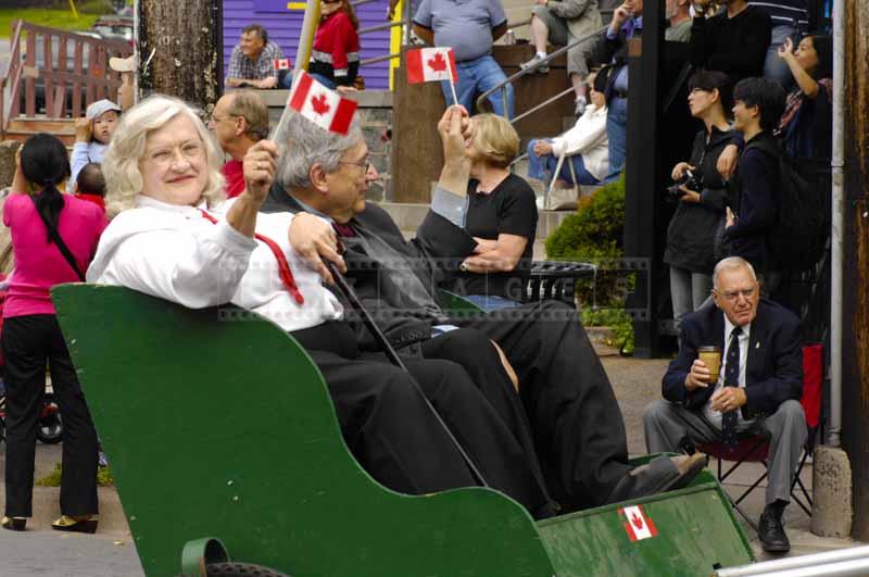 Old couple with flags