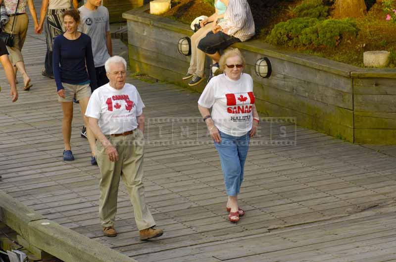 People wearing t-shirts with Canada flags