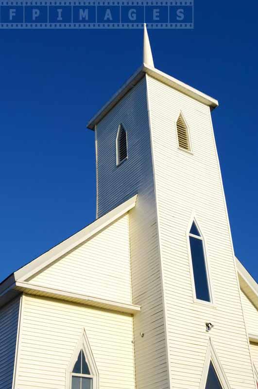 Blue skies and white church architecture