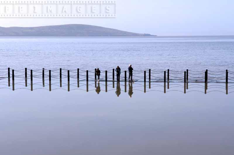 Marine lake dam almost covered by water