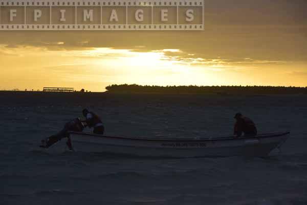 Two fishermen in a boat